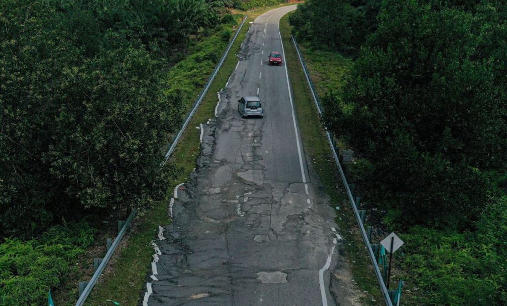 kesan jalan rosak pada suspensi motor